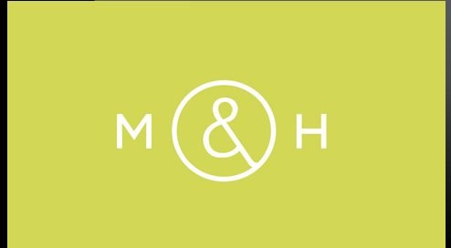 Animated SVG monogram of the letters M and H